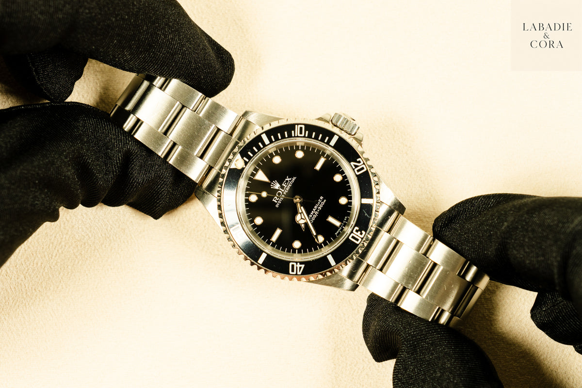 Rolex Submariner 14060 No-Date watch with black dial and bezel